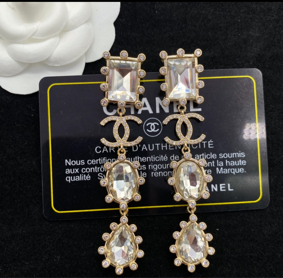 Chanel woman dangle earrings