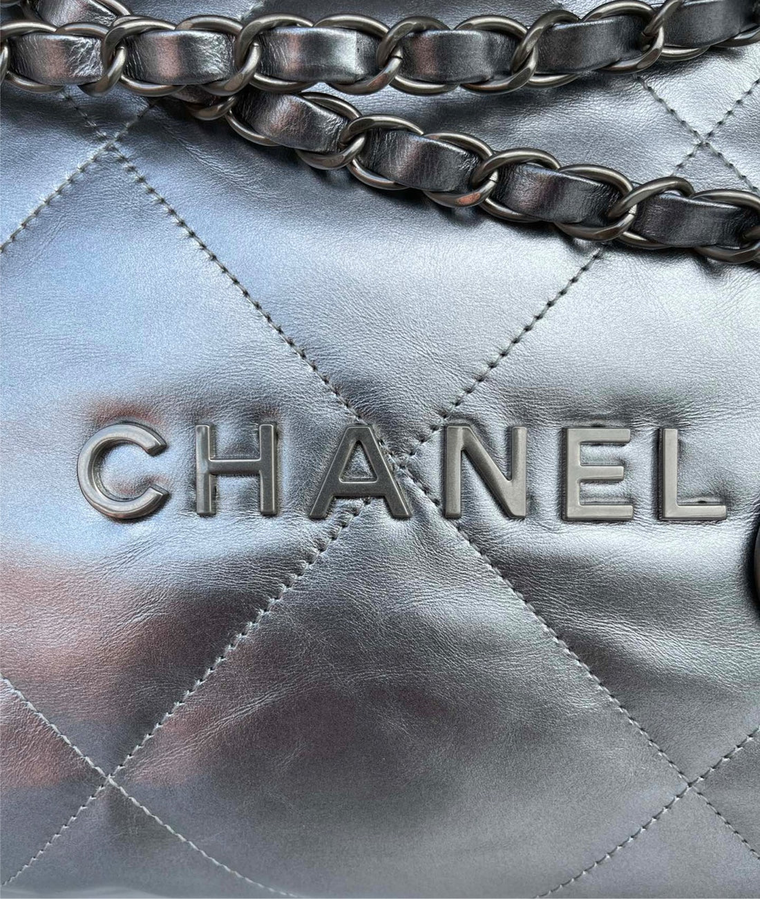 Silver Chanel woman shoulder handbag