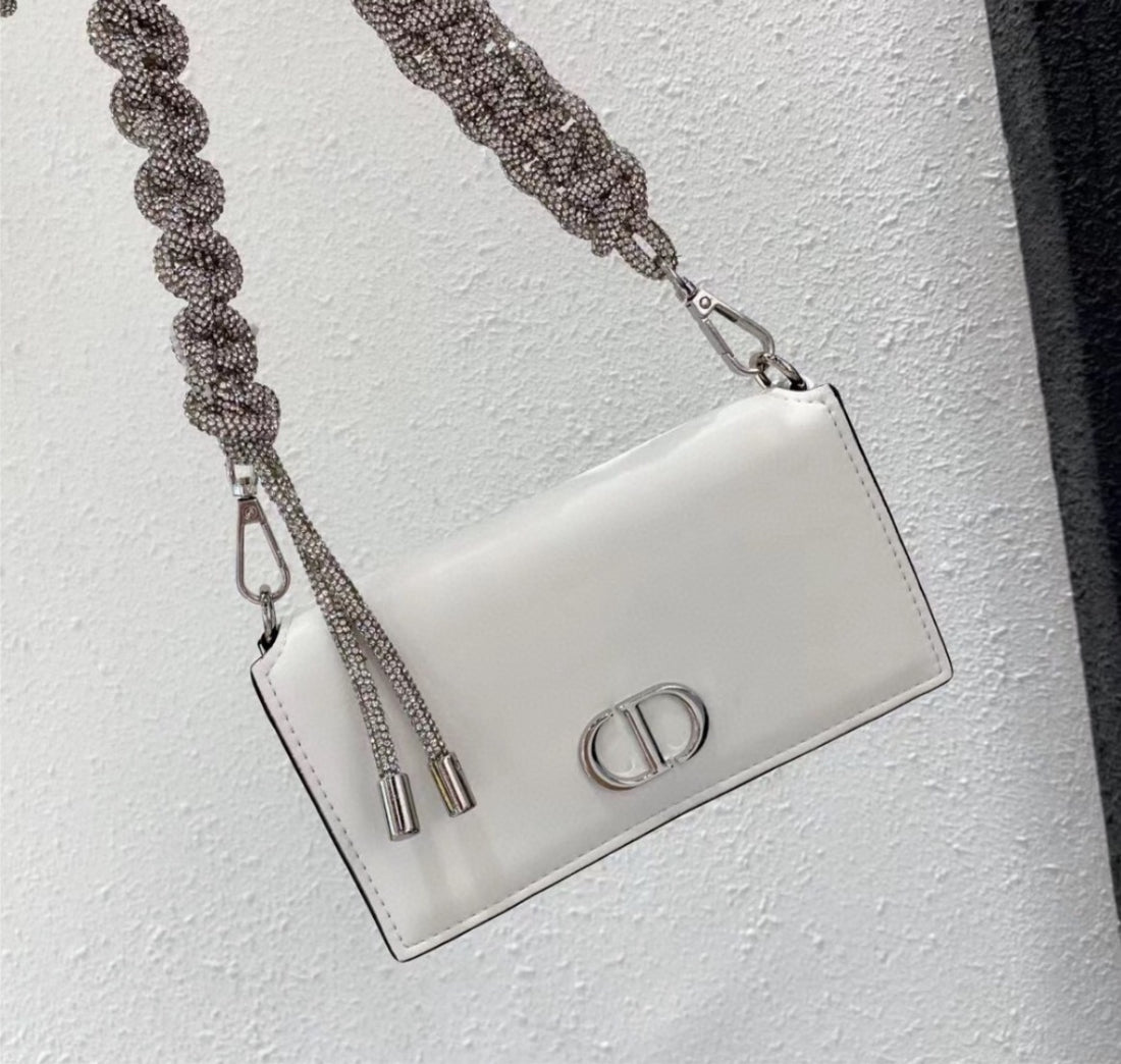 Woman Dior shoulder handbag