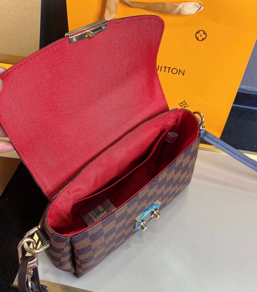 LV a woman shoulder handbag