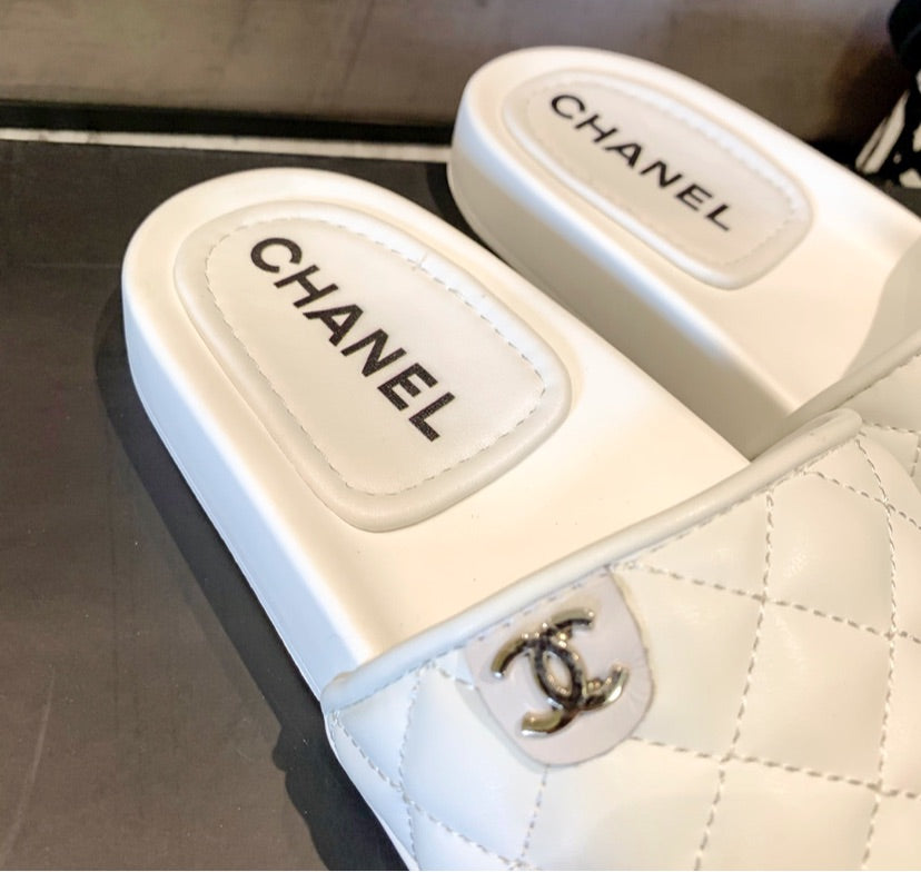Chanel woman slides