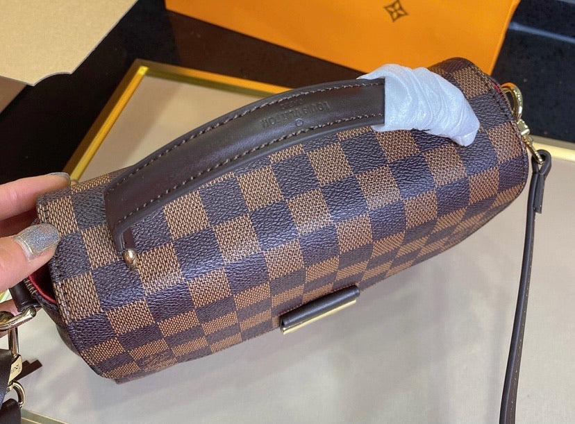 LV a woman shoulder handbag