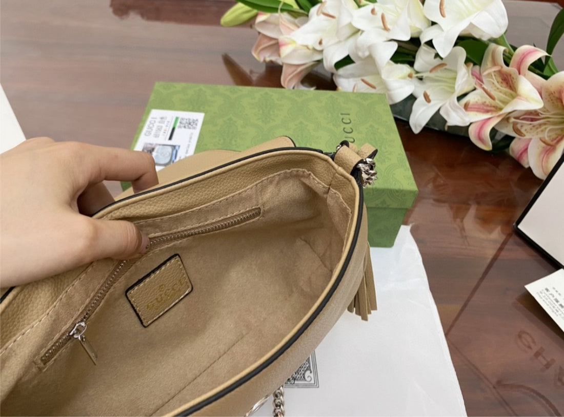 Gucci woman tan shoulder handbag