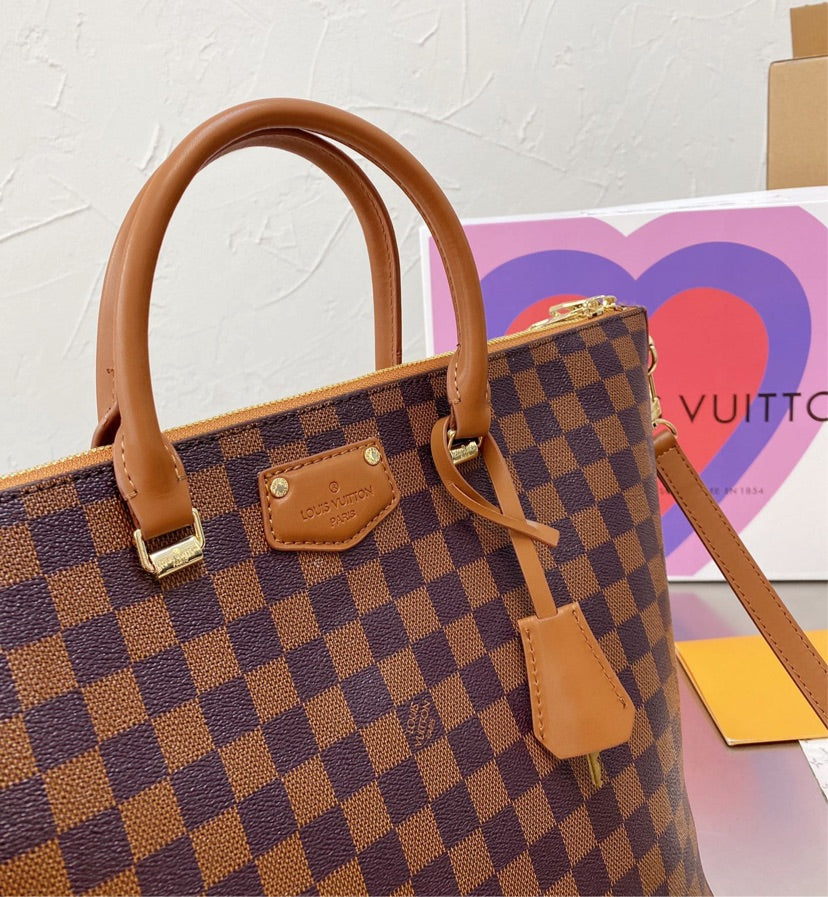 brown LV woman handbag