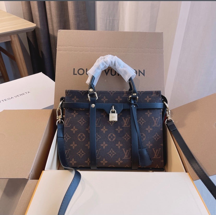 LV a woman shoulder handbag