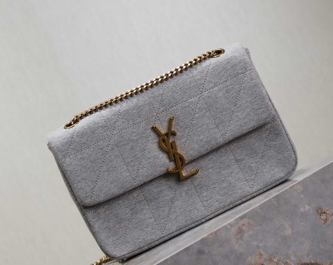 Grey YSL woman shoulder handbag