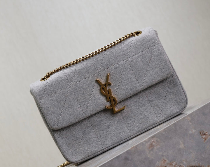Grey YSL woman shoulder handbag