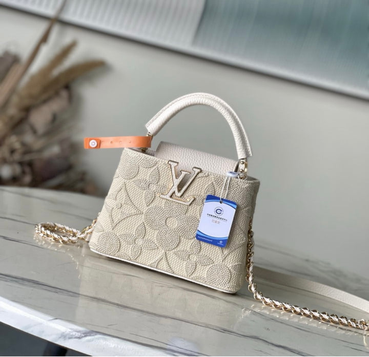 Stylish beige LV woman handbag
