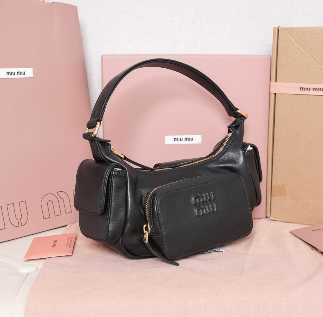 Black leather MIU MIU handbag
