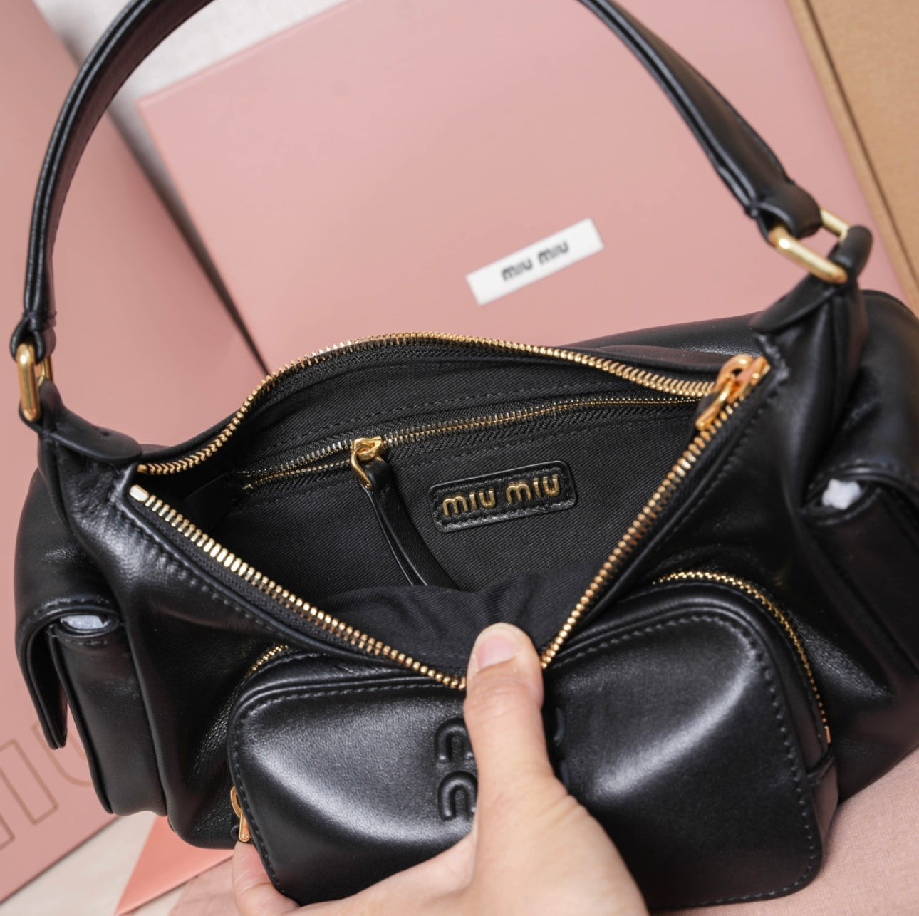 Black leather MIU MIU handbag