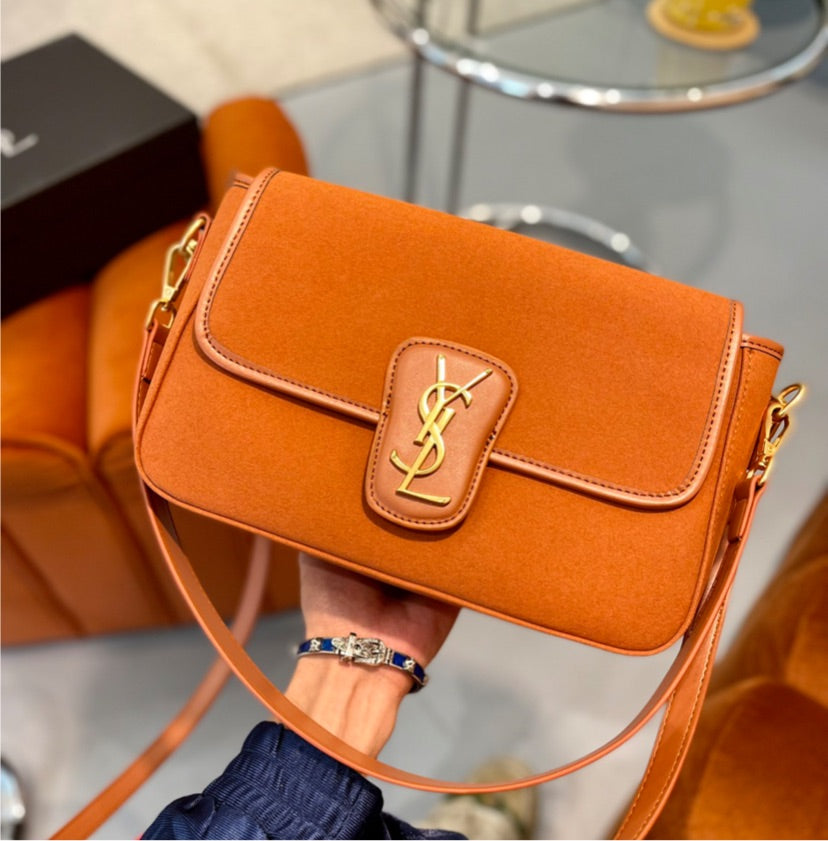 Pop of color YSL woman handbag