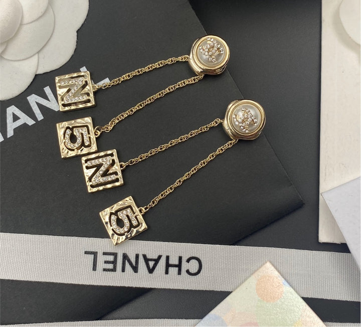 Woman Chanel earrings