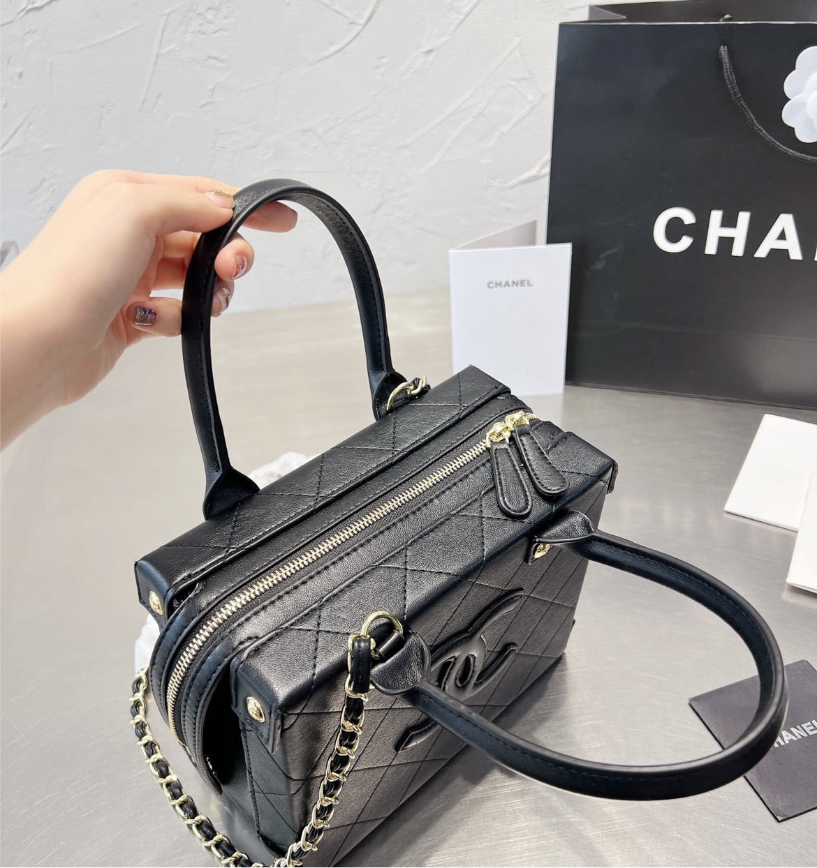 New woman Chanel handbag
