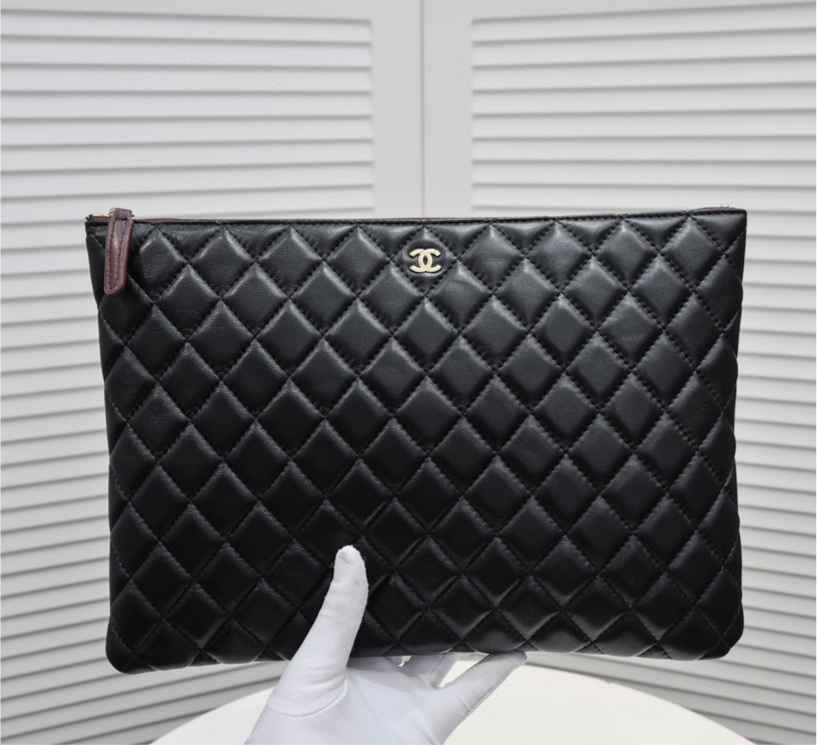 Chanel big handbag/clutch