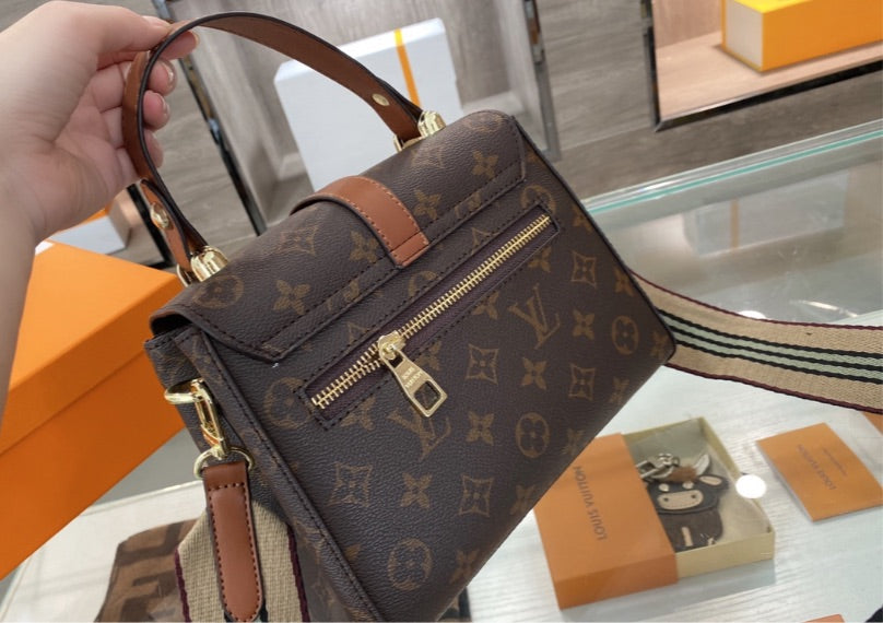 Leather LV a woman handbag