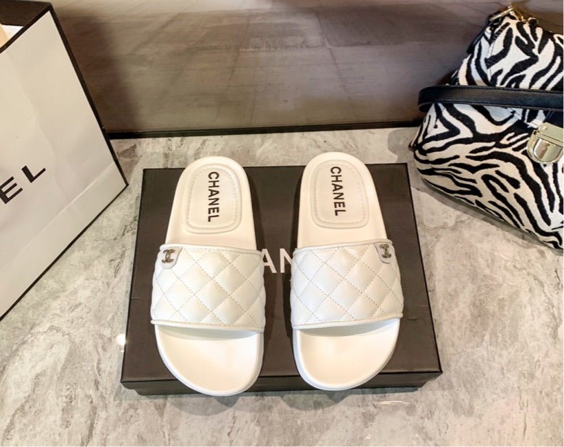 Chanel woman slides