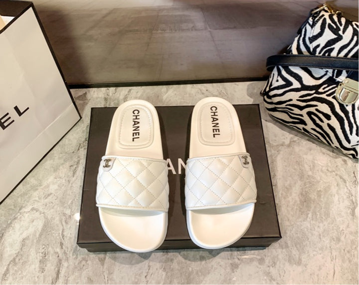 Chanel woman slides
