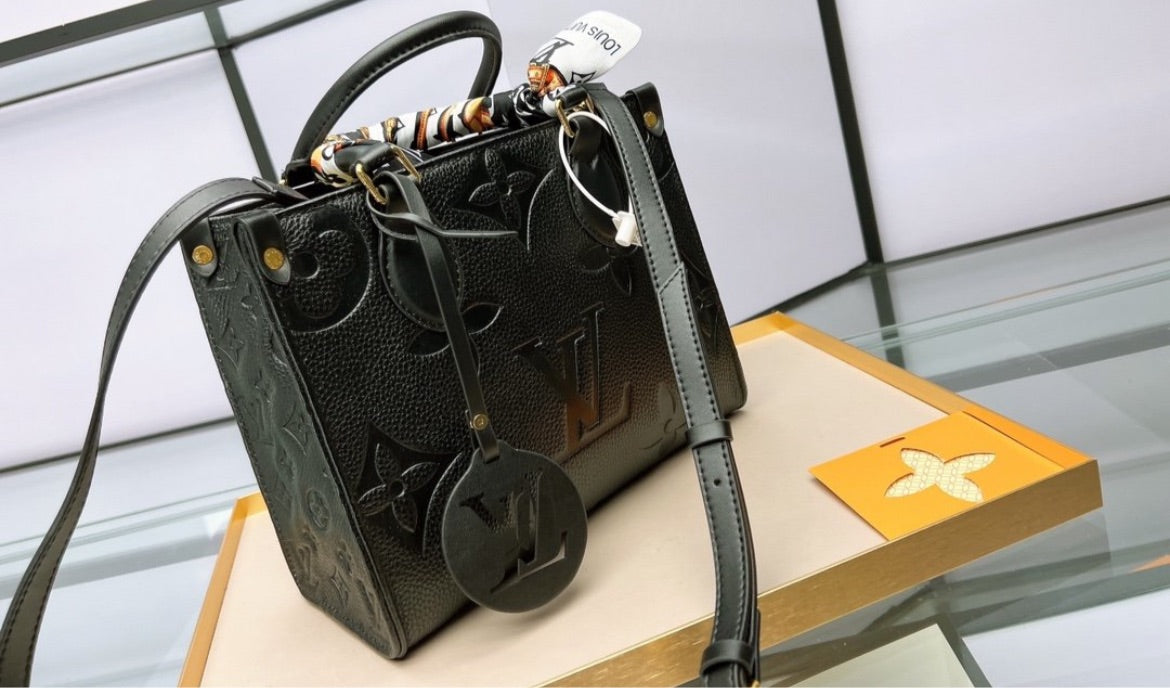 LV woman shoulder handbag