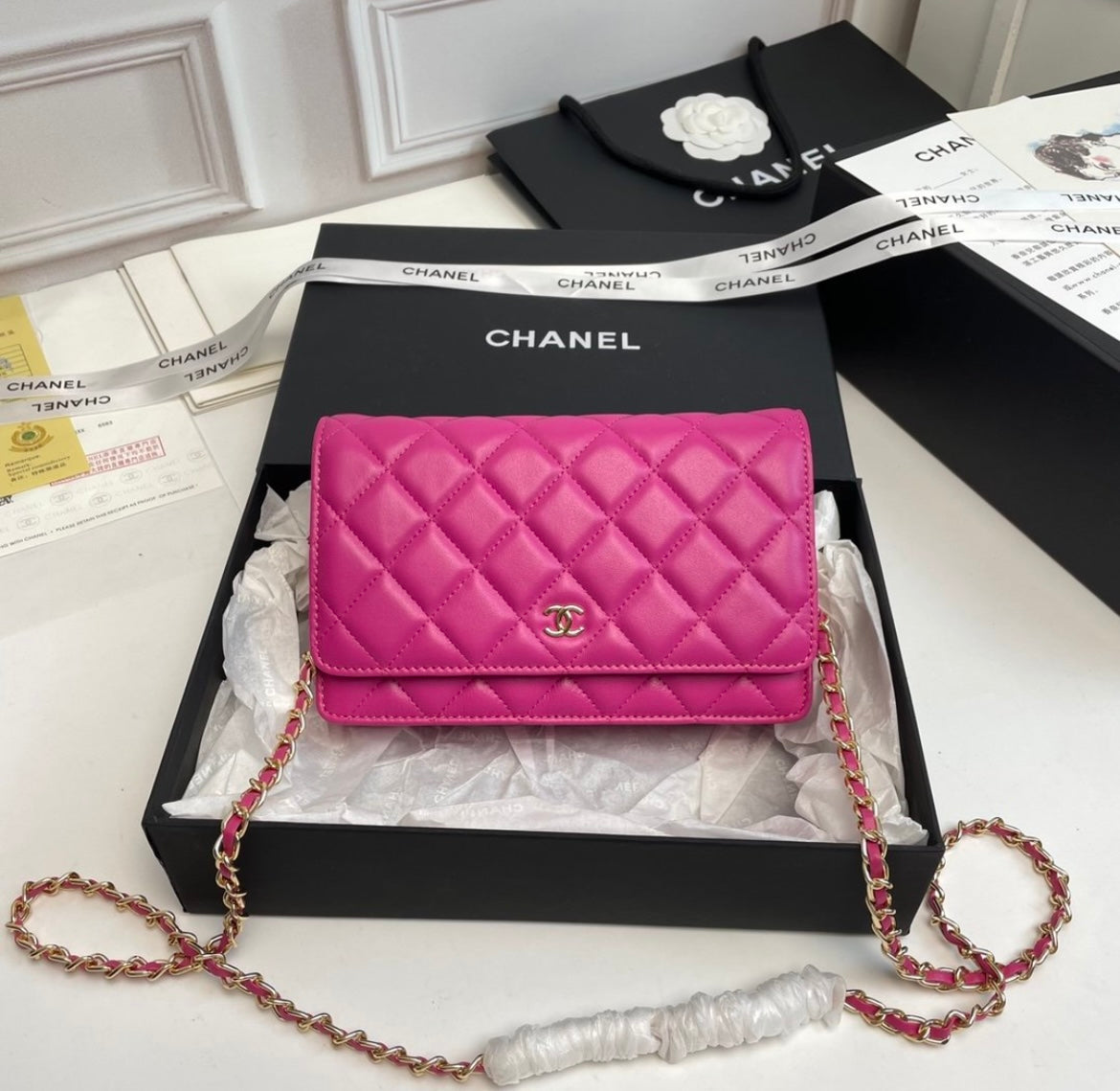 Woman pink Chanel handbag