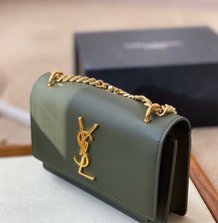 Green YSL woman shoulder handbag