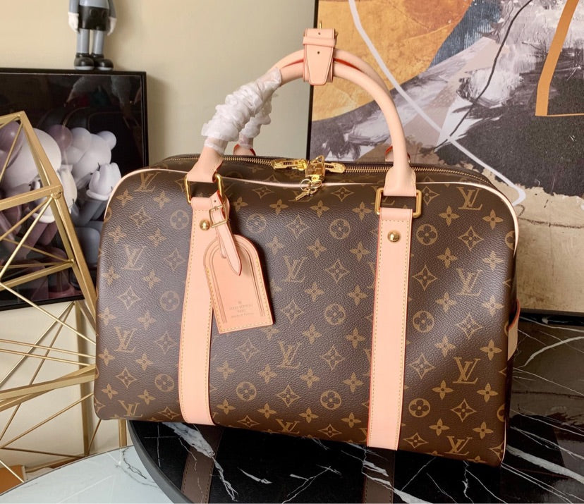 LV overnight / travel Handbag