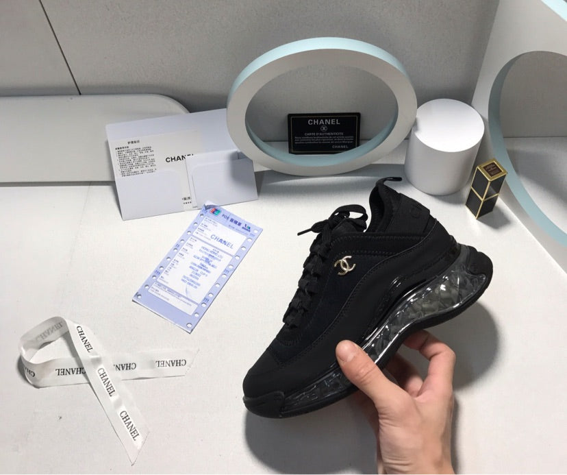 Black Chanel sneakers