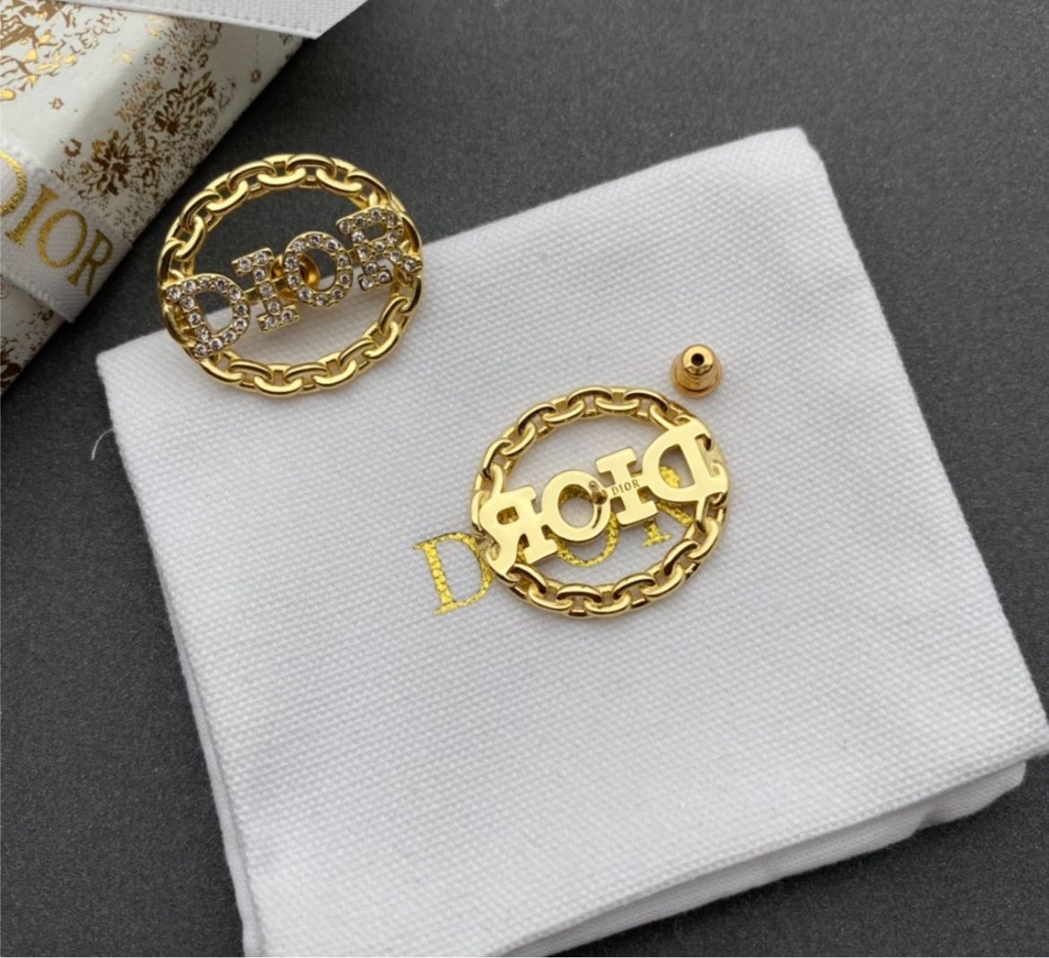Dior woman hoop earring