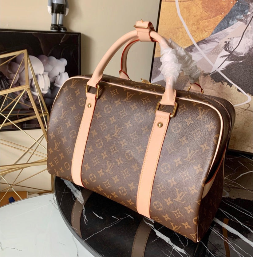 LV overnight / travel Handbag