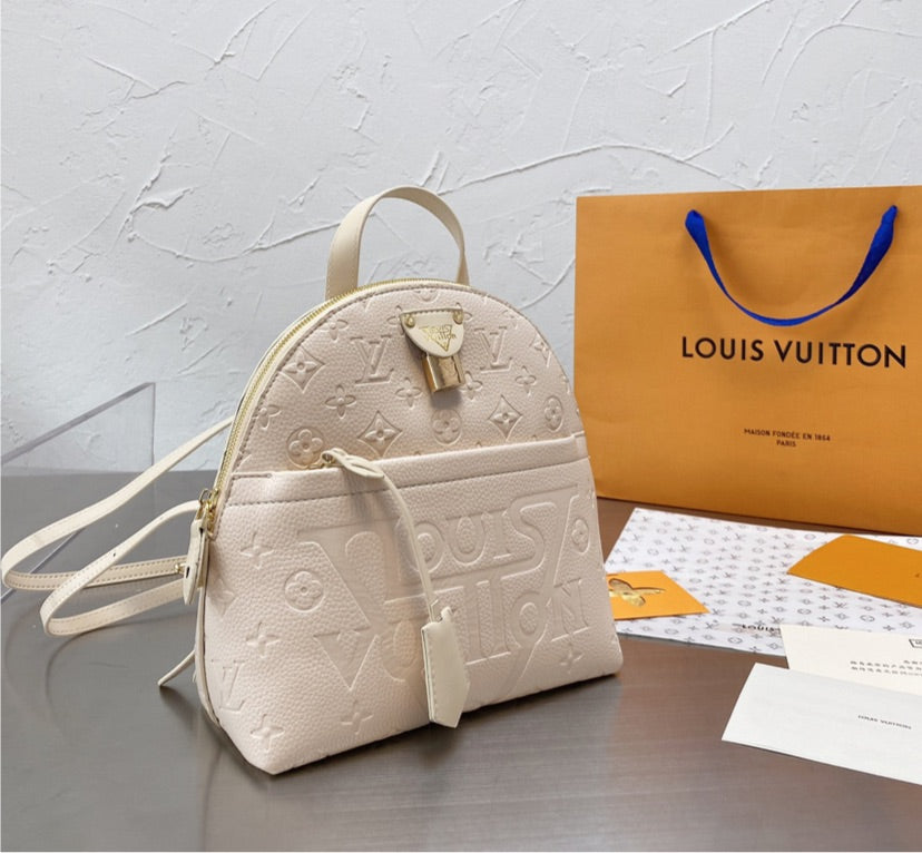 Leather LV shoulder handbag/ backpack