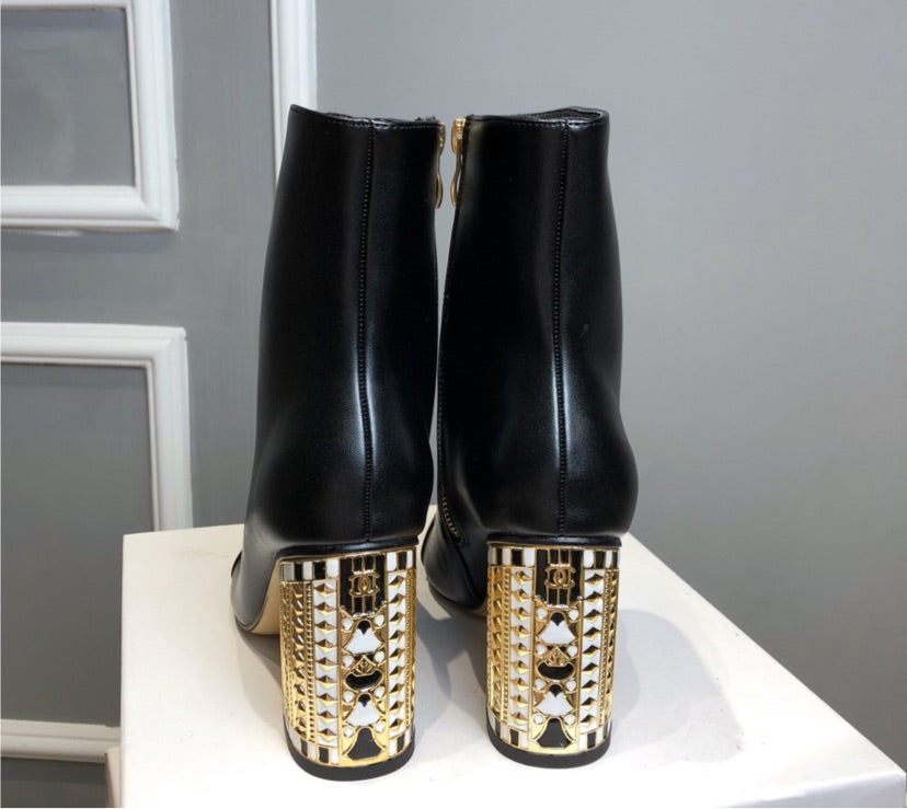 Black woman Chanel Boots