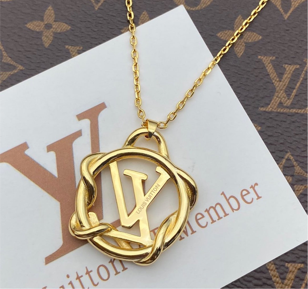 Louis V woman necklace