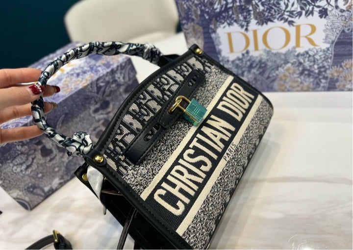 New woman Dior handbag