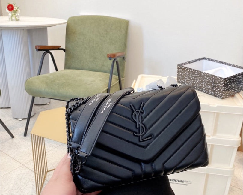 Woman YSL shoulder handbag