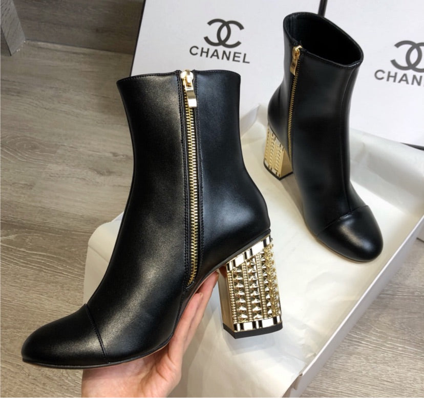 Black woman Chanel Boots