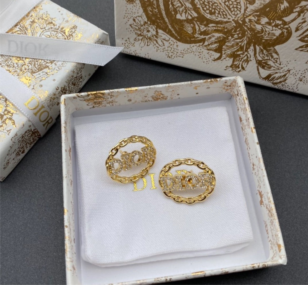 Dior woman hoop earring