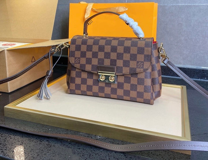 LV a woman shoulder handbag