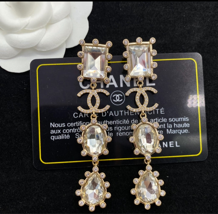 Chanel woman dangle earrings