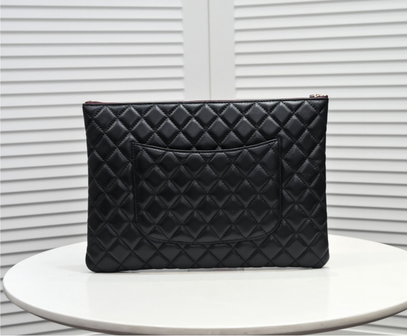 Chanel big handbag/clutch