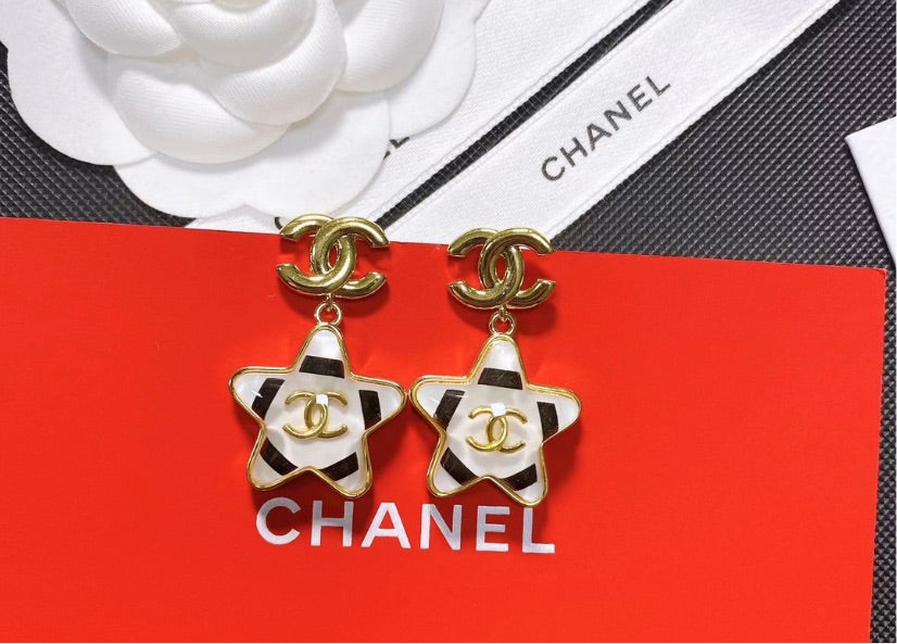 Woman Chanel earrings