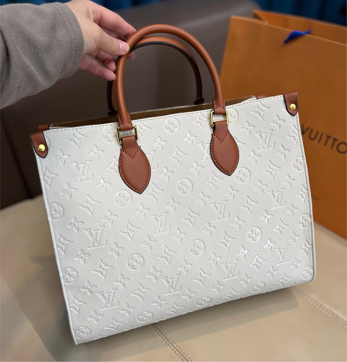 Woman Louis V handbag