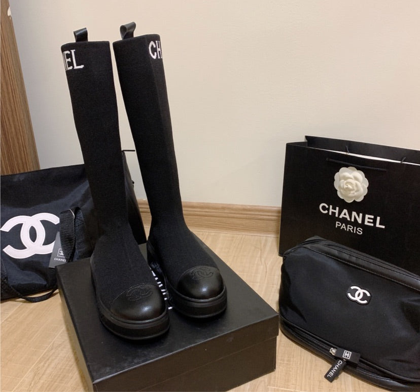 Black Chanel woman boots