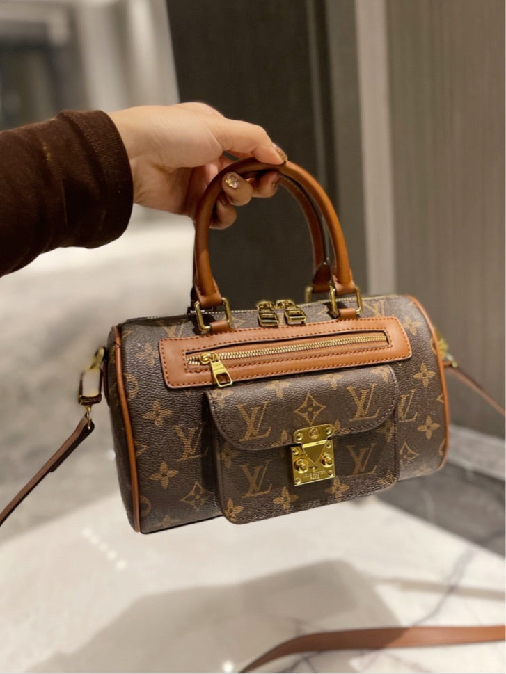 Woman shoulder LV handbag