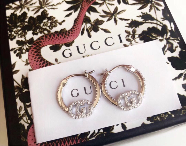 New woman Gucci earrings