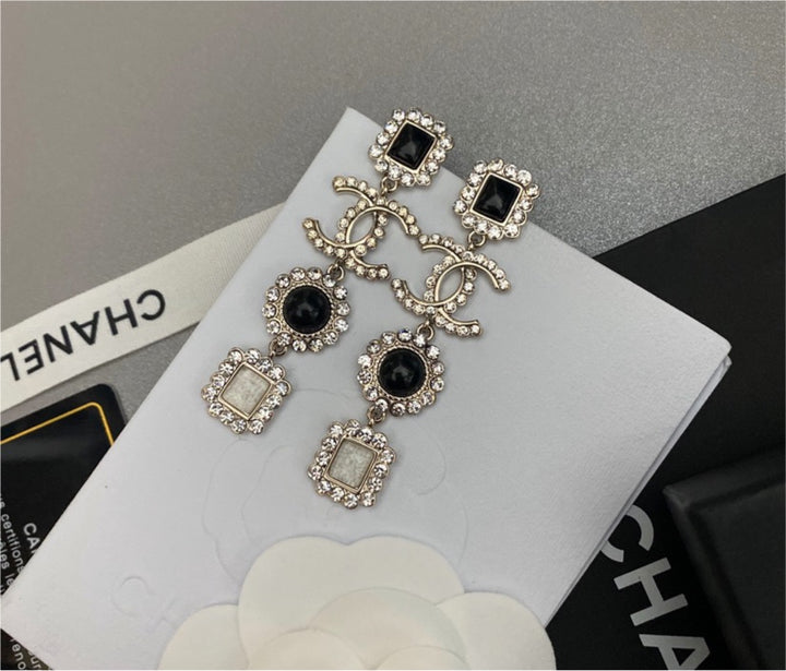 Woman Chanel earrings