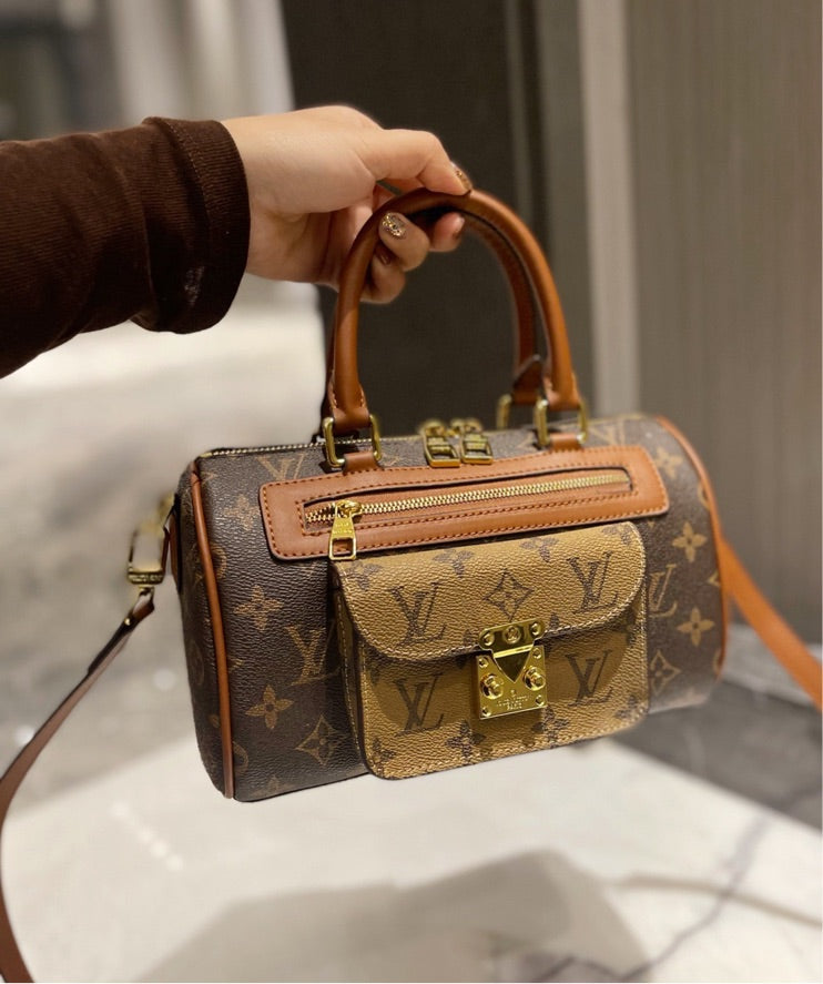 Woman shoulder LV handbag