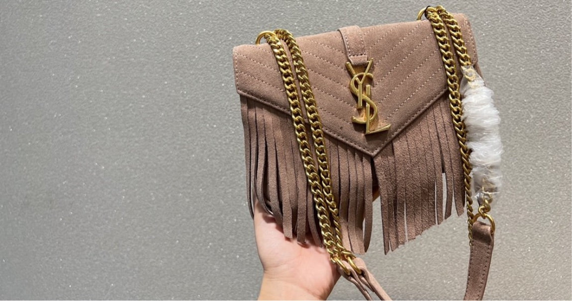Woman Fringe YSL handbag