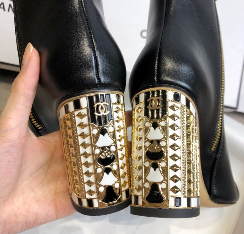 Black woman Chanel Boots