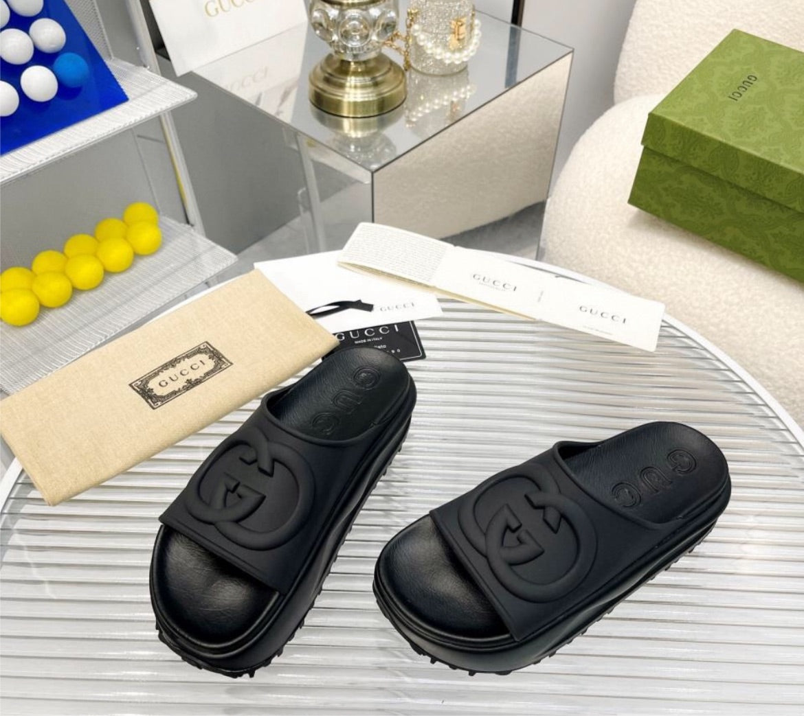 Black Gucci slides