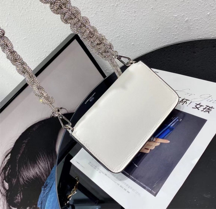 Woman Dior shoulder handbag