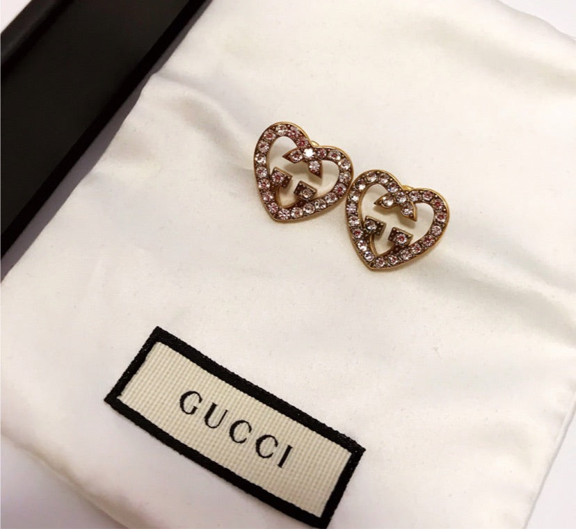 Gucci woman heart shaped earrings
